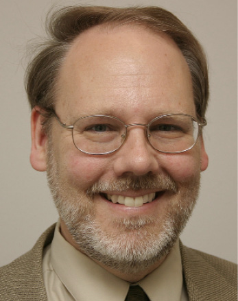 Portrait image of author Thomas Dean.