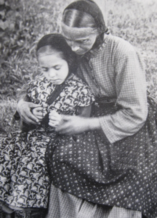 Knitting lesson, circa 1907. Photo by Bertha Shambaugh
