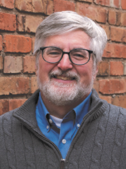 Portrait image of author Dan Weeks.