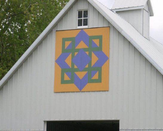 “Celtic Sunrise” on the barn of Jim and Pat McIlrath, Newburg Road east of Highway 146. The barn, built in 1956, held corn when it was still picked and stored in the ear. Photo courtesy of Janet Carl.