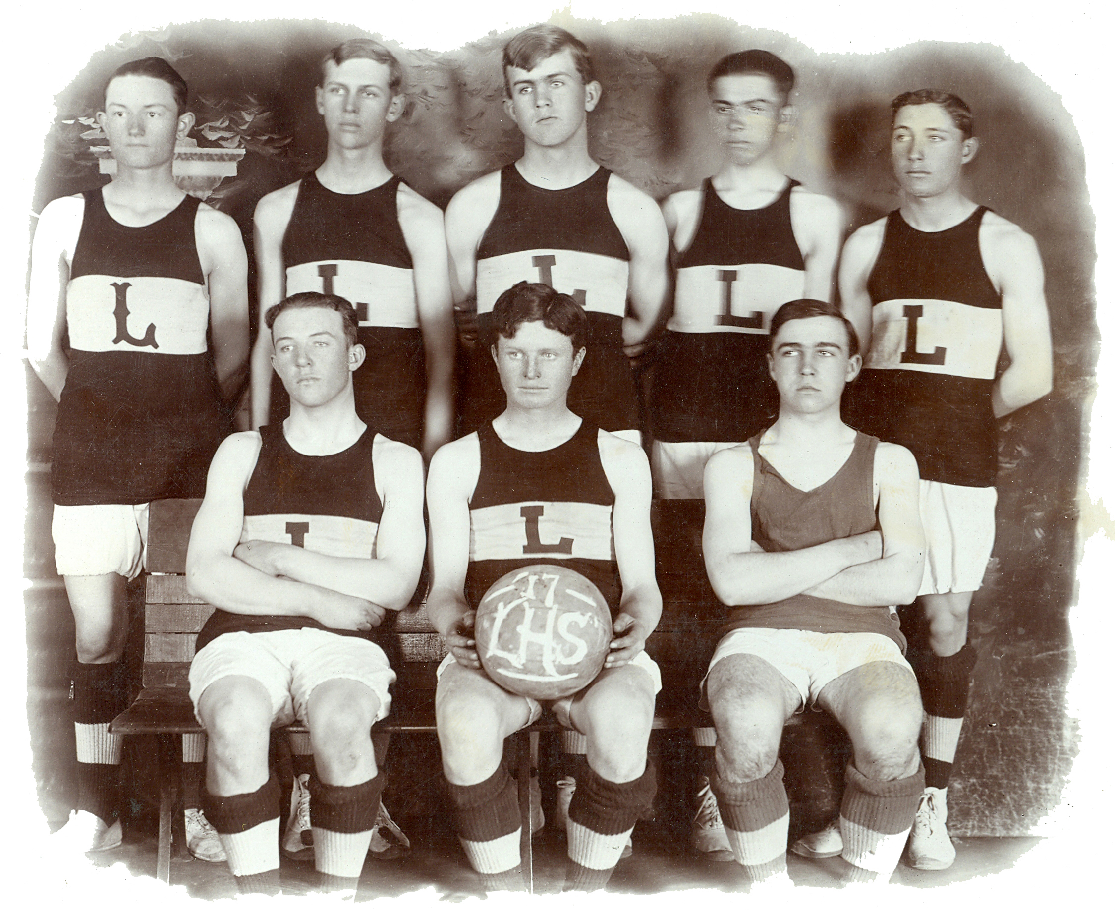 1917 Lorraine High School Basketball team. Edward Janzen is standing at the far right