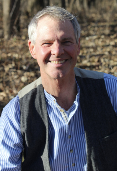 Portrait image of author Jon Andelson.
