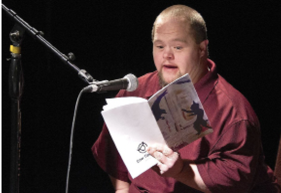 Cow Tipping author and teaching apprentice Nathan Bauer reading one of his poems