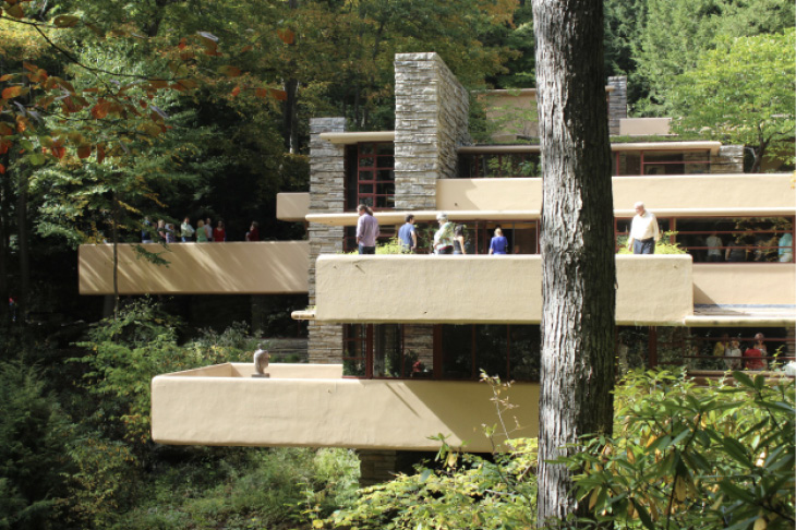 Fallingwater, the retreat Frank Llyod Wright designed for the Kaufmann family in the woods of Mill Run, Pennsylvania. Photo by R London, 2014, from Wikimedia Commons.