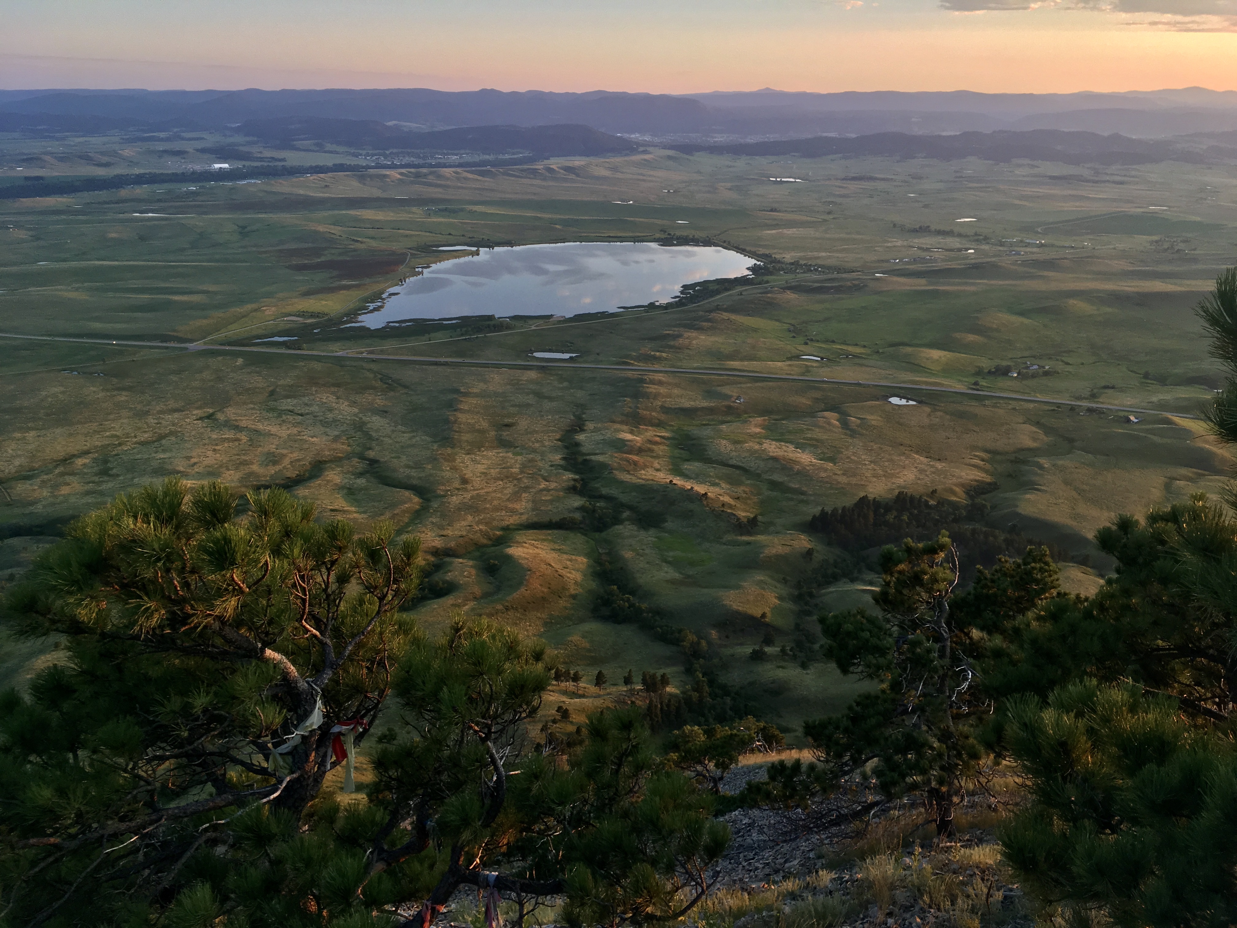 Looking west toward Sturgis from the summit of Bear Butte, SD (northern terminus of GPT pilot trail and Centennial Trail) at sunset.