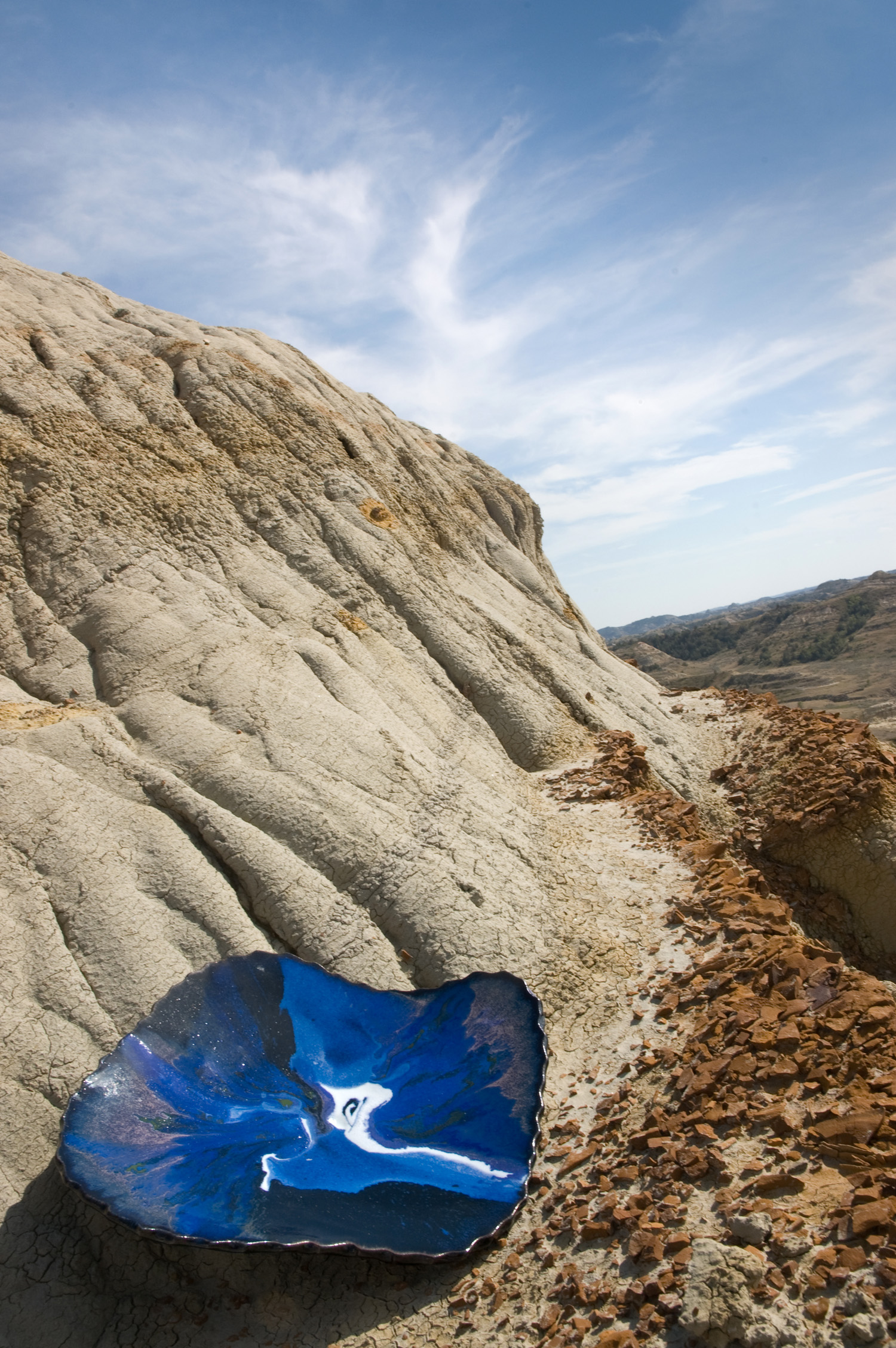 Smith's work reflects the badlands locale in which it's created