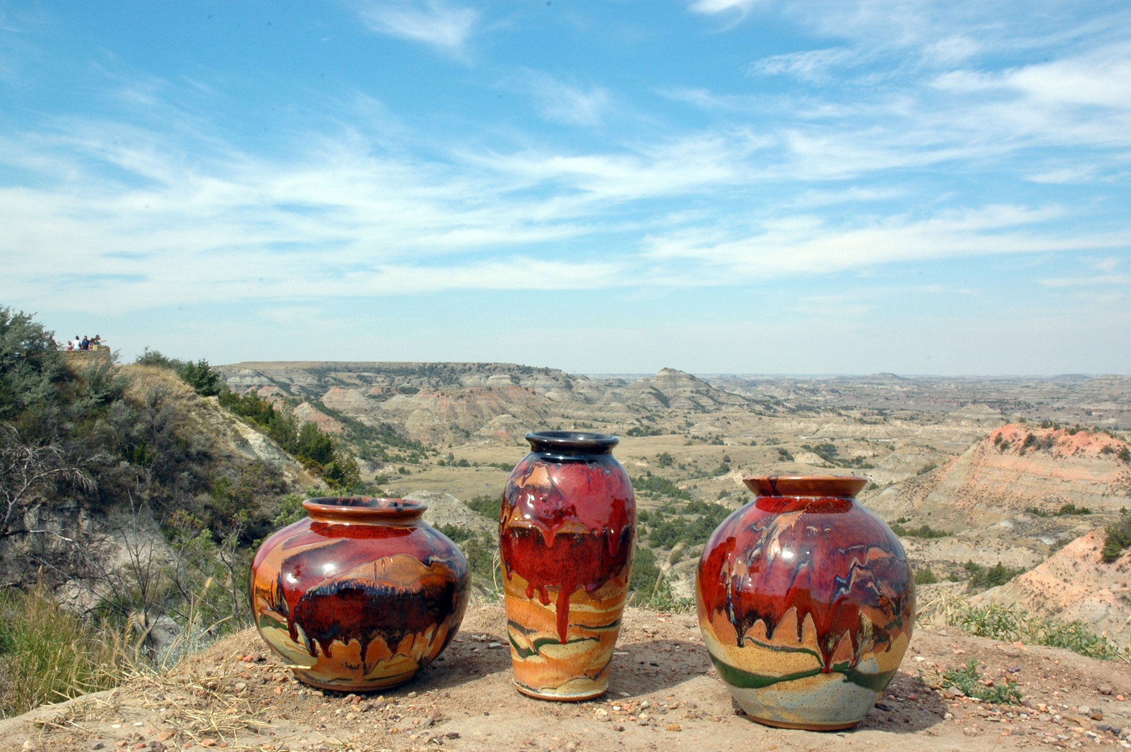 Smith's pottery and the landscape which inspires it, 'striped in the colors of red, tan and black by prairie fires'