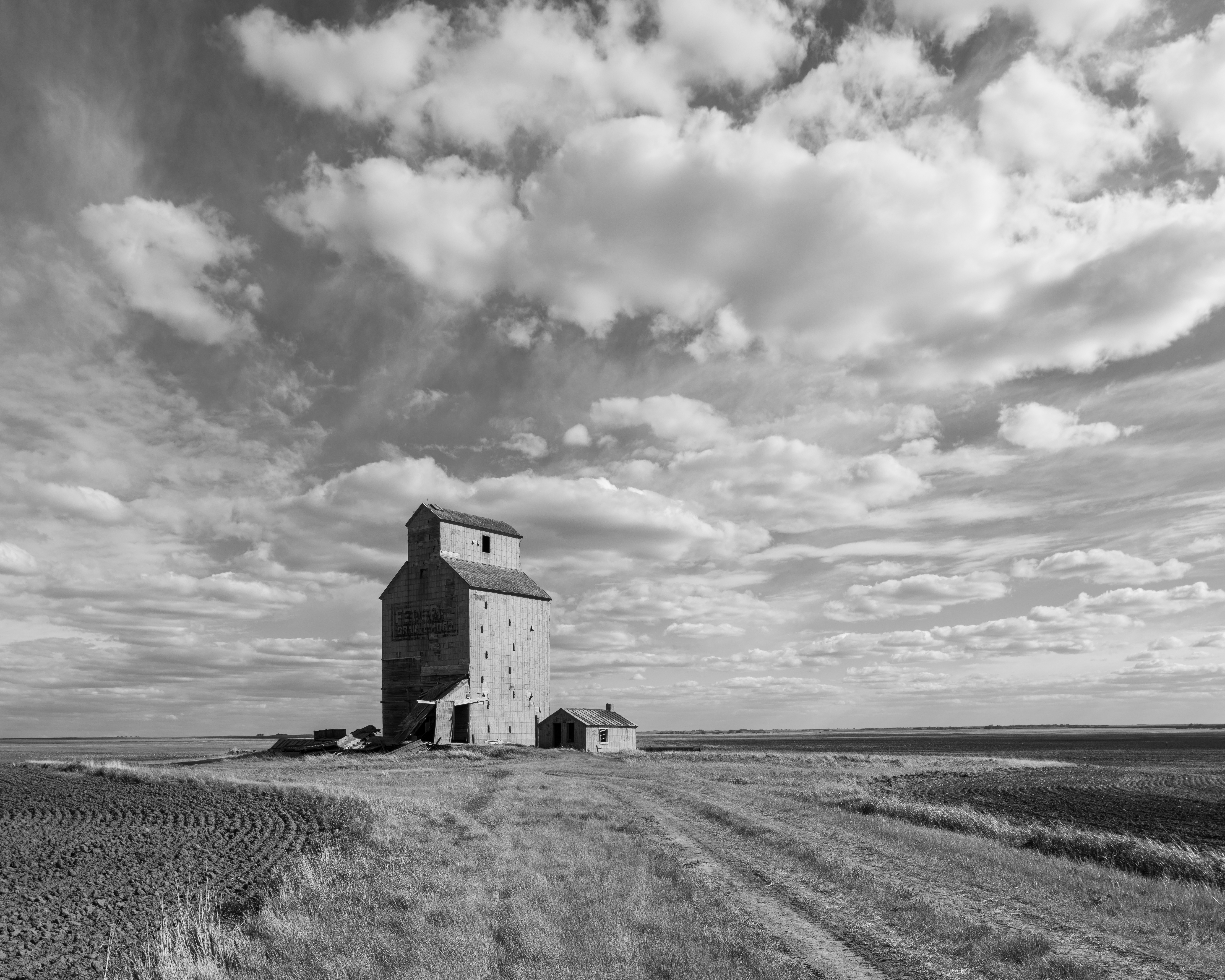 Grain elevator and cloudscape, Saskatchewan