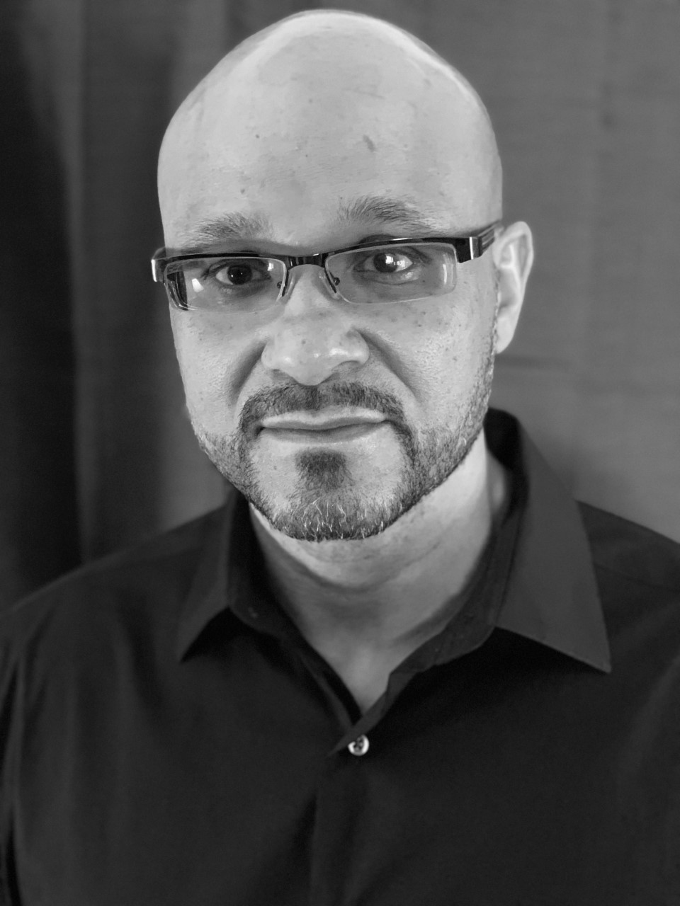 Portrait image of author Jason Ross.