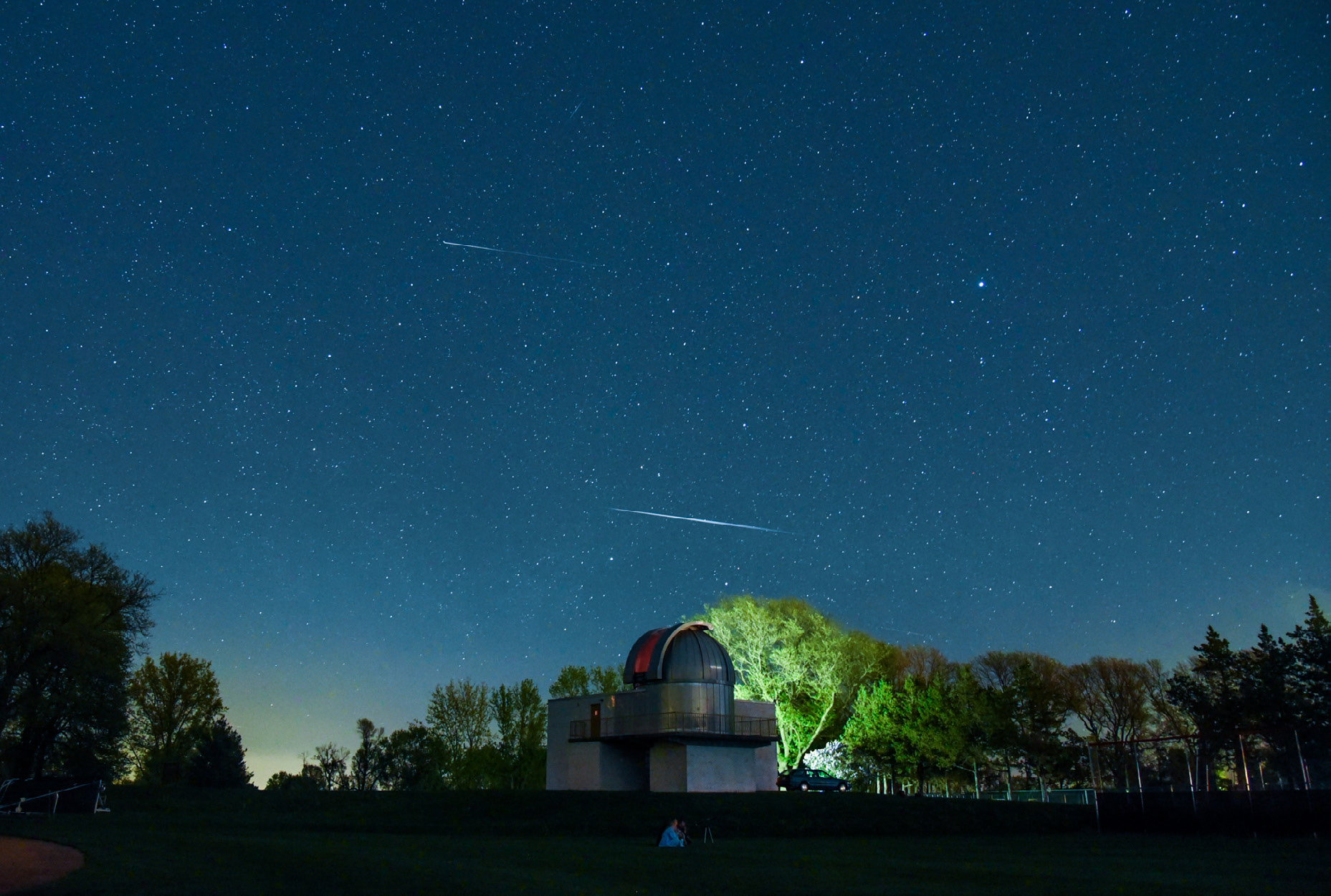 Watching a meteor shower from a field near Grinnell College’s Grant Gale Observatory. Photo by [Scott Lew](https://instagram.com/bellagio3?igshid=YmMyMTA2M2Y=)