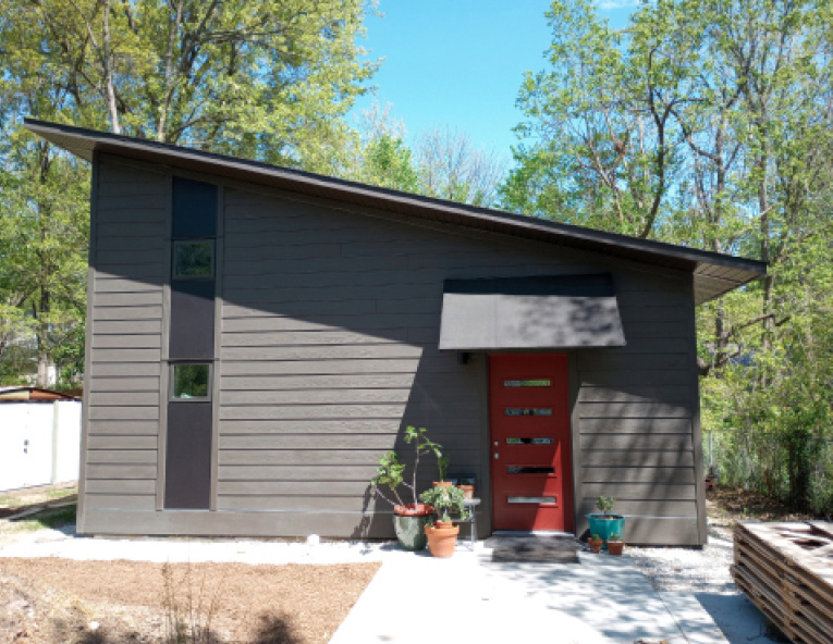 Adrienne and Adam's accessory dwelling unit (ADU) in Columbia, Missouri. The more conventional aesthetic of the ADU helps it blends into the neighborhood. Just looking at it, you wouldn't guess what lies within! Photo courtesy of Adrienne Stolwyk.