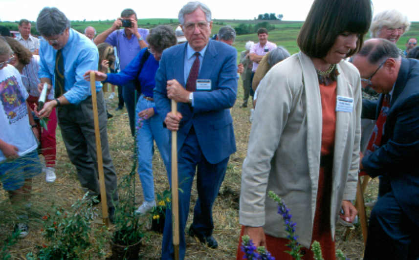 Neal Smith with U.S. Fish & Wildlife Service Director Mollie Beattie and other dignitaries, planting native species during Prairie Learning Center Ground Breaking, September 1st, 1994. Photo courtesy of Fish & Wildlife Service and Neal Smith NWR 