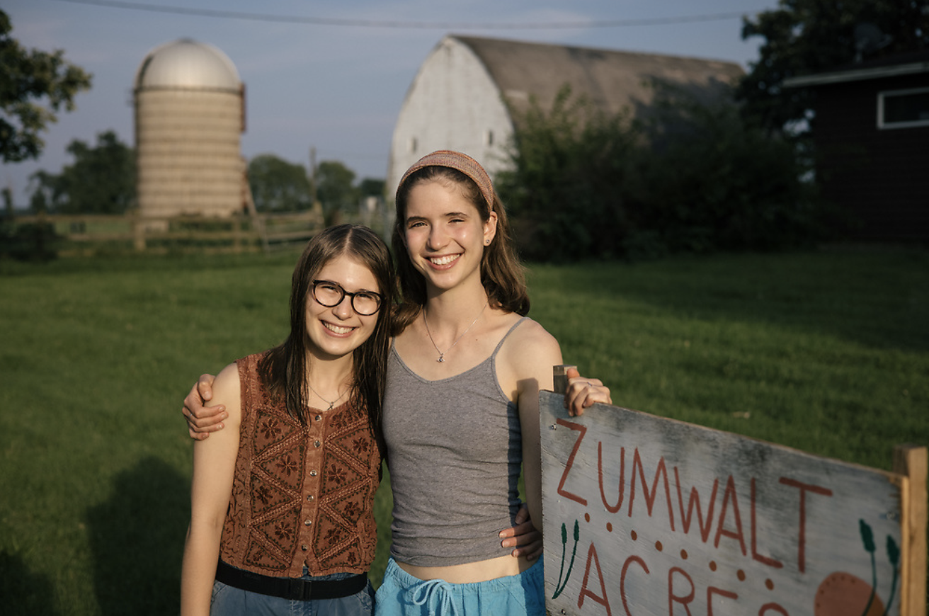 Two women standing next to each other