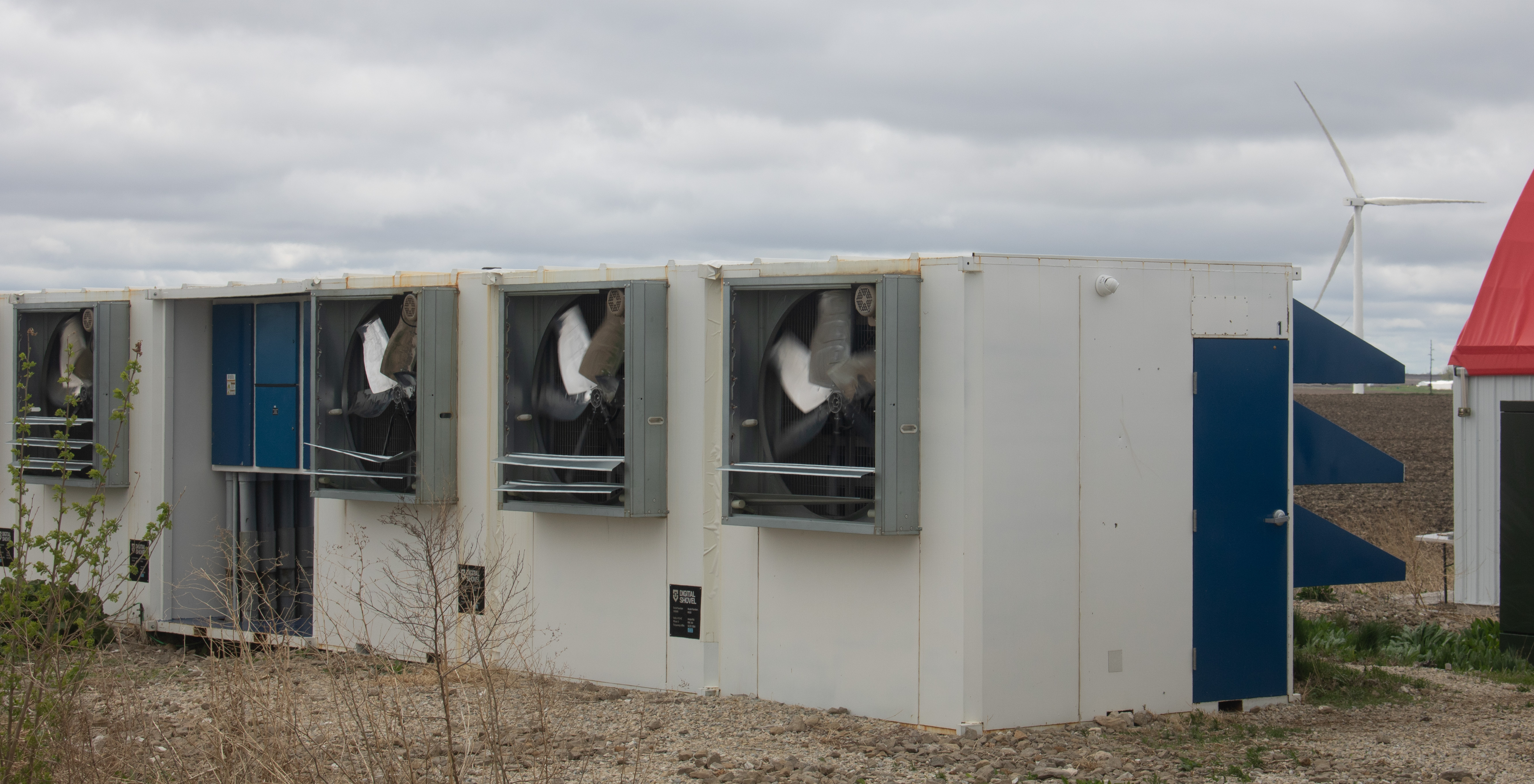 A row of white boxes with windows