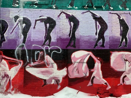 A mural of people dancing.