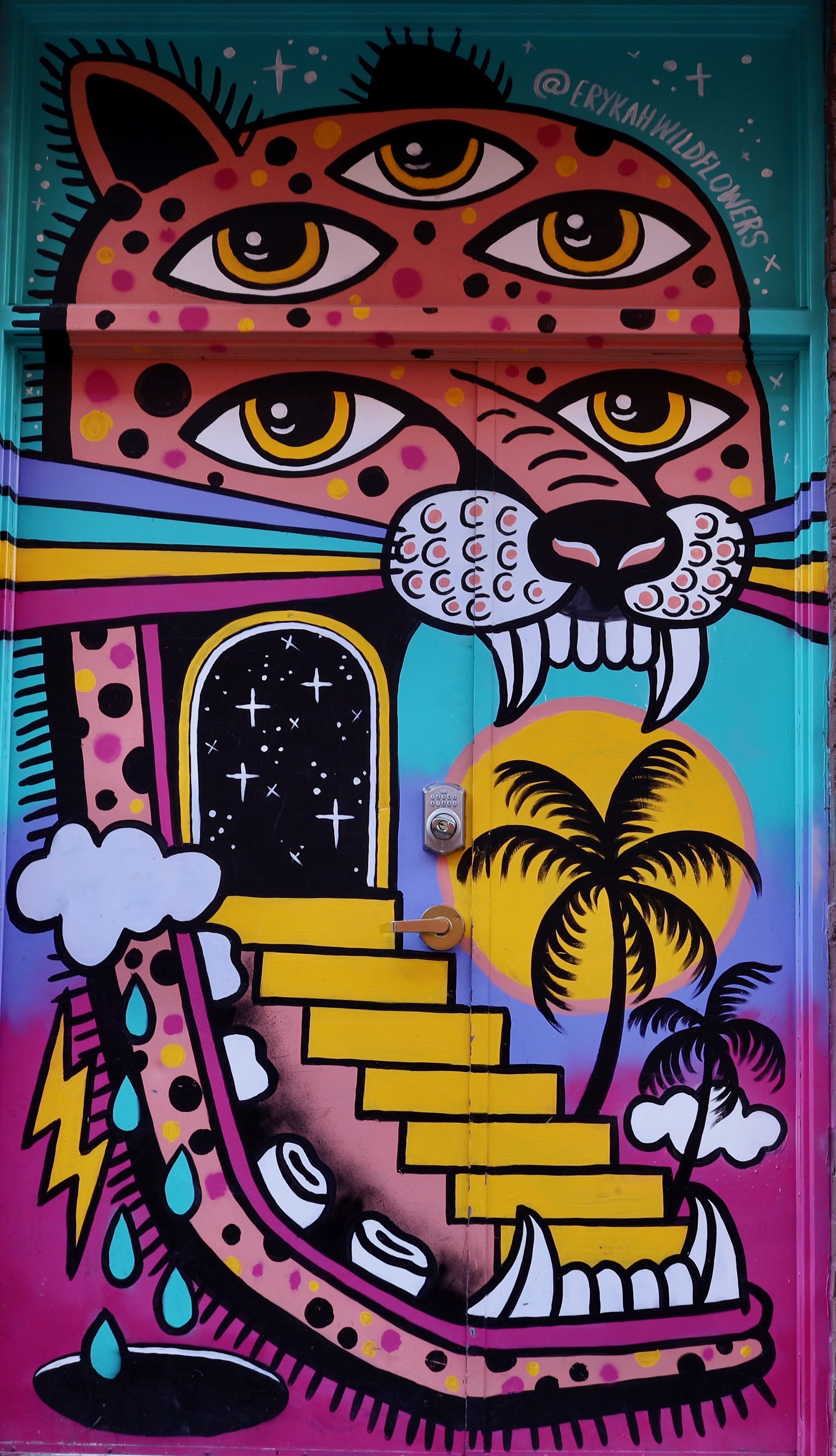 A colorful painting on a door